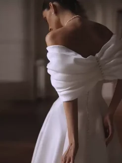 Robe de mariée simple en polyester avec décolleté sans manches et n艙uds robe de bal 50 cm