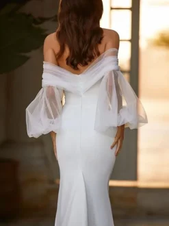 Robe de mariée sirène bustier zip sur dos jupe fendue au sol