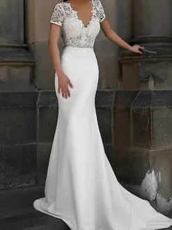 Robe de mariée sirène col V manche courte décoré des boutons sur dos à traîne