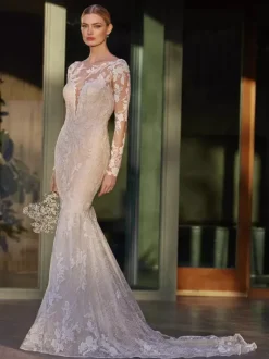 Robe de mariée sirène décolleté illusion manches longues taille naturelle dentelle avec traîne