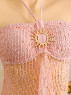 Robe de plage midi dos nu à boutons soleil en maille ajourée transparente