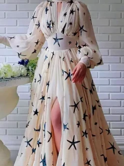 Robe de soirée bleu océan à col montant et sequins manches longues bouffantes coupe élégante et semi-formelle.