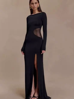 Robe de soirée maxi moulante à manches longues fente haute et découpes latérales en résille collection 2026
