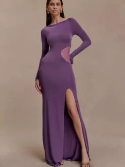 Robe de soirée maxi moulante à manches longues fente haute et découpes latérales en résille collection 2026