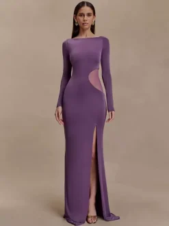 Robe de soirée maxi moulante à manches longues fente haute et découpes latérales en résille collection 2026