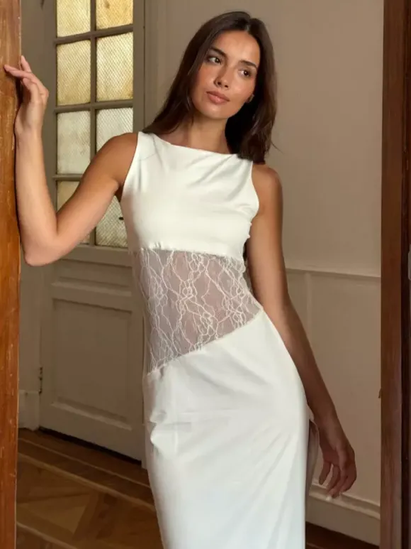 Robe de soirée noire et blanche moulante midi sans manches taille en dentelle découpée sans manches.