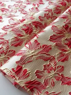 Robe de soirée pour la mère de la mariée décolleté travaillé manches courtes coupe trapèze longueur thé.