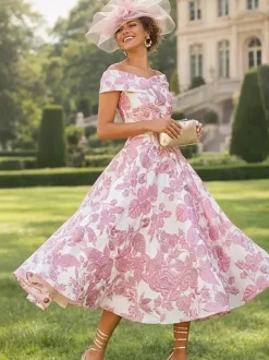 Robe de soirée pour la mère de la mariée décolleté travaillé manches courtes coupe trapèze longueur thé.