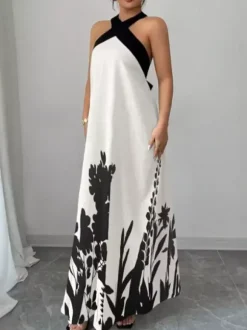 Robe de vacances maxi dos nu à lacets sans manches imprimé floral col halter élégante blanche