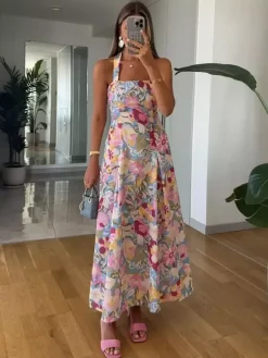 Robe de vacances sculptante dos nu en dentelle sans manches à bretelles imprimées rose élégante