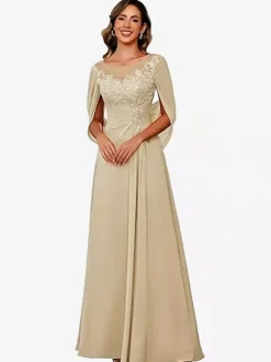 Robe d'invitée pour la mère de la mariée décolleté illusion manches mi-longues coupe trapèze en dentelle longueur au sol idéale pour un mariage.