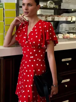 Robe d'été mini rouge plissée à manches courtes col en V et taille cache-c艙ur à pois pour femme.
