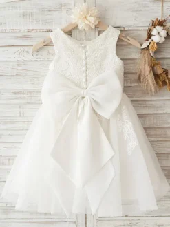 Robe fille de fleur ivoire en tulle col rond en dentelle boutonné sur dos avec noeud robe cortège enfant