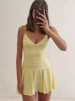 Robe jaune sexy mini à lacets sans manches dos nu et bretelles.