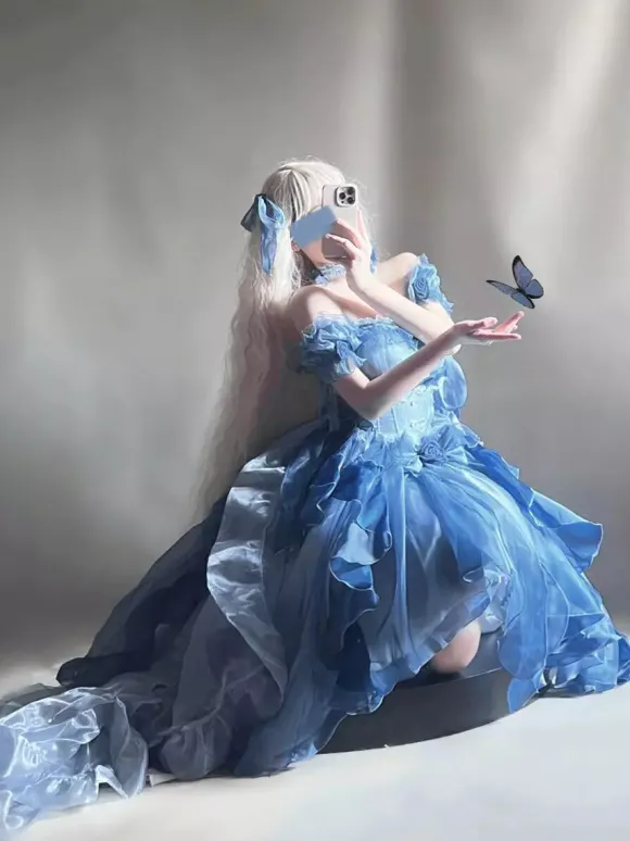 Robe Lolita Fée Bleue coupe asymétrique jolis n艙uds dos nu bretelles bandage et volants