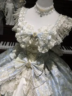 Robe Lolita Sweet Lolita en polyester sans manches dentelle bandage et n艙uds bleu ciel clair