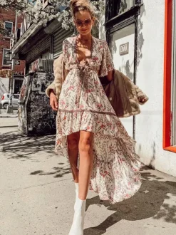 Robe longue bohème fleurie asymétrique pour femme - Rose crème découpes n艙ud sur le devant manches papillon - Été 2026