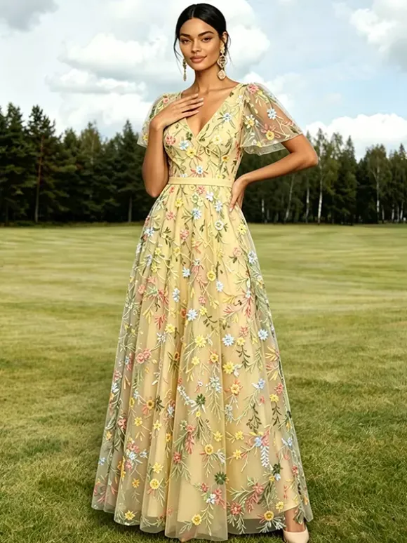 Robe longue de soirée lilas poudré en tulle brodé de fleurs col V manches courtes papillon coupe trapèze robe d'invitée de mariage