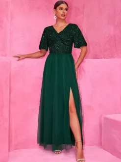 Robe longue de soirée vert foncé à paillettes et fente haute pour soirées 2026