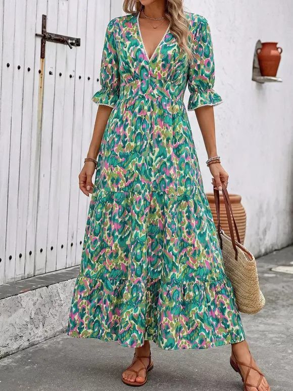 Robe longue de vacances bohème verte à imprimé abstrait col en V manches courtes à volants taille élastiquée ourlet à volants.