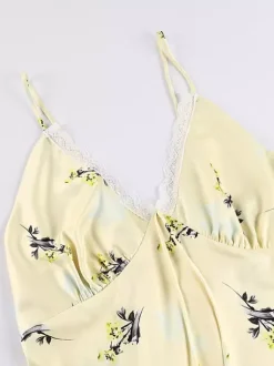 Robe longue d'été chic abricot sans manches dos nu bretelles et décolleté.