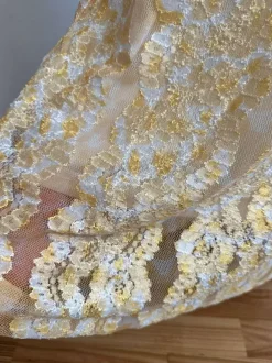 Robe longue en dentelle sans manches décolleté en V profond et dos nu été 2026