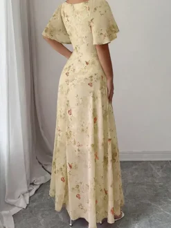 Robe longue en mousseline imprimée papillons pour femme - Buste froncé manches papillon - Idéale pour une soirée romantique ou un mariage d'été au jardin (collection 2026)