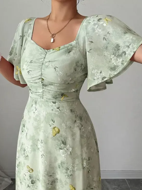 Robe longue en mousseline imprimée papillons pour femme - Buste froncé manches papillon - Idéale pour une soirée romantique ou un mariage d'été au jardin (collection 2026)