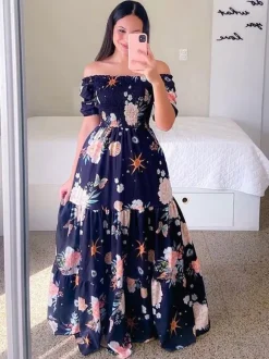 Robe longue imprimée à épaules dénudées et smocks pour femme - Robe d'été trapèze à manches courtes et volants - Idéale pour les vacances d'été à la plage 2026