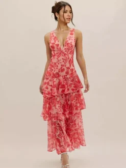 Robe longue à volants superposés et imprimé floral avec décolleté en V profond et dos ouvert 2026