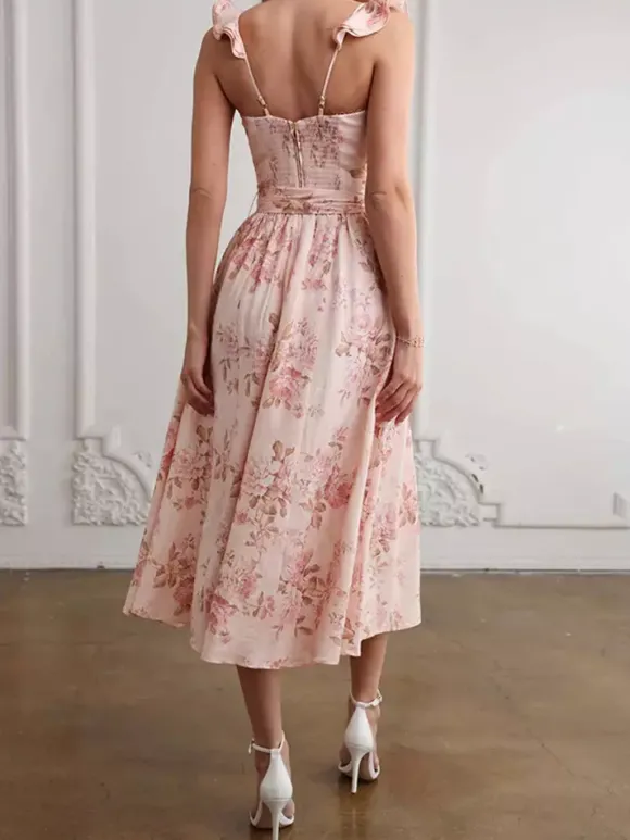 Robe mi-longue fleurie sans manches décolleté en c艙ur et fente haute été 2026