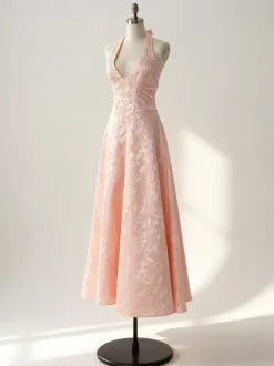 Robe mi-longue à fleurs rose pâle col licou coupe trapèze style vintage pour femme 2026