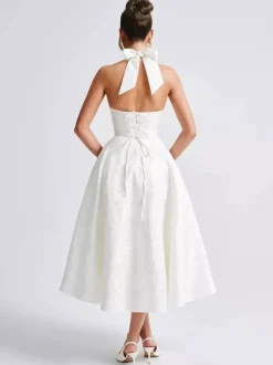 Robe mi-longue à fleurs rose pâle col licou coupe trapèze style vintage pour femme 2026