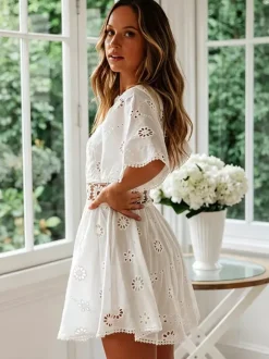 Robe mini dos nu à 艙illets blancs pour femme - Robe d'été bohème en coton coupe évasée et manches bouffantes - Idéale pour les vacances d'été à la plage 2026