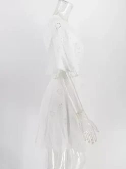 Robe mini dos nu à 艙illets blancs pour femme - Robe d'été bohème en coton coupe évasée et manches bouffantes - Idéale pour les vacances d'été à la plage 2026