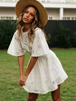 Robe mini dos nu à 艙illets blancs pour femme - Robe d'été bohème en coton coupe évasée et manches bouffantes - Idéale pour les vacances d'été à la plage 2026