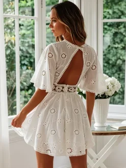 Robe mini dos nu à 艙illets blancs pour femme - Robe d'été bohème en coton coupe évasée et manches bouffantes - Idéale pour les vacances d'été à la plage 2026