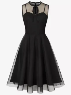 Robe rétro bordeaux transparente style années 50 sans manches col rond coupe rockabilly longueur moyenne.