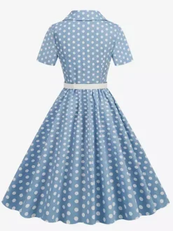 Robe rétro glamour style années 50 col rabattu boutons manches courtes robe trapèze à pois