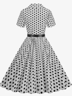 Robe rétro glamour style années 50 col rabattu boutons manches courtes robe trapèze à pois