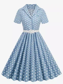 Robe rétro glamour style années 50 col rabattu boutons manches courtes robe trapèze à pois