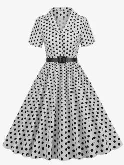 Robe rétro glamour style années 50 col rabattu boutons manches courtes robe trapèze à pois