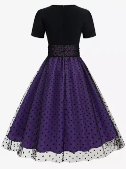 Robe rétro glamour style années 50 col rond manches courtes superposées taille moyenne à pois style rockabilly