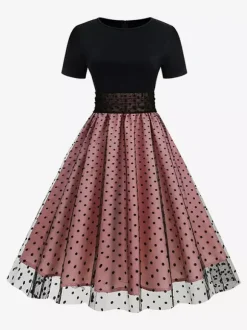 Robe rétro glamour style années 50 col rond manches courtes superposées taille moyenne à pois style rockabilly