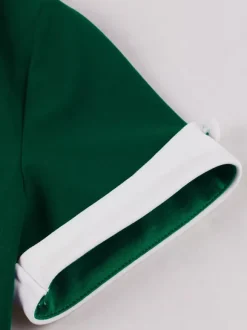 Robe rétro swing à manches courtes et col à revers contrastant pour femme 2026