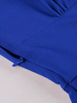 Robe rétro swing pour femme col en V froncée sur le devant boutons décoratifs manches papillon collection 2026