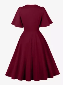 Robe rétro swing pour femme col en V froncée sur le devant boutons décoratifs manches papillon collection 2026