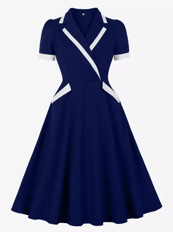 Robe rétro trapèze à col à revers contrasté et double poche pour femme (collection 2026)