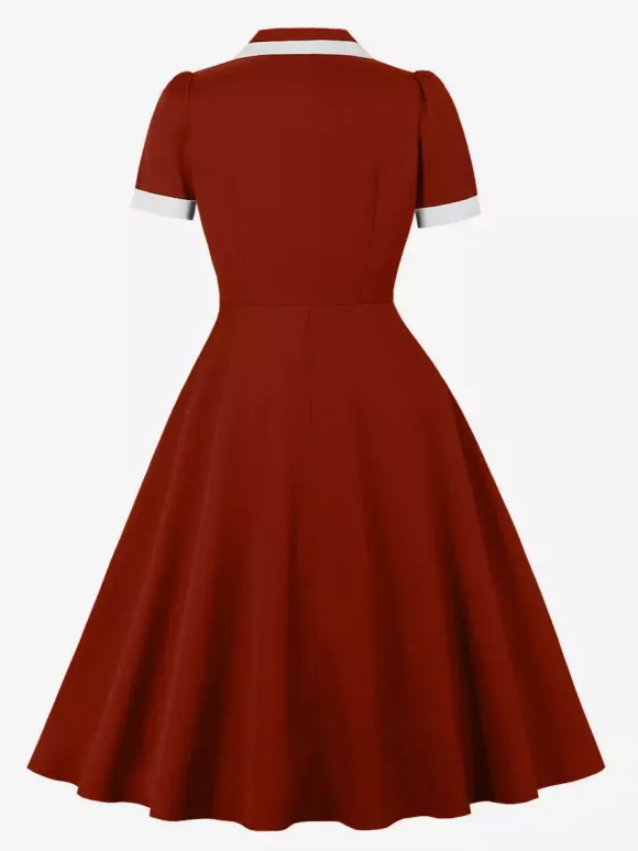 Robe rétro trapèze à col à revers contrasté et double poche pour femme (collection 2026)