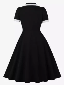 Robe rétro trapèze à col à revers contrasté et double poche pour femme (collection 2026)